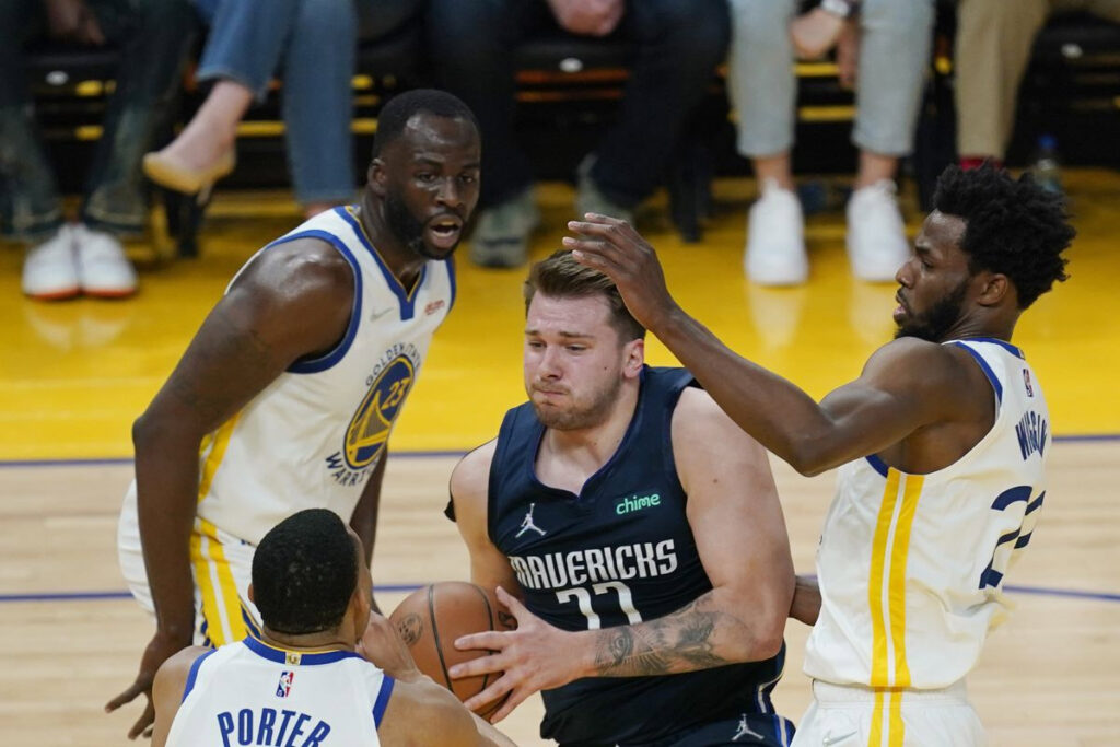 The Golden State Warriors NBA defense team, Draymond Green, Andre Iguodala and Kevon Looney